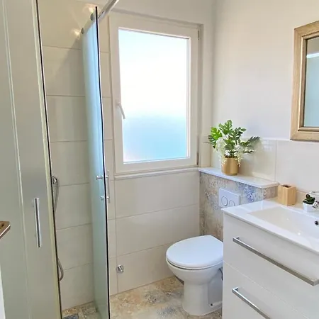 Апартаменти Tomi & Ivana